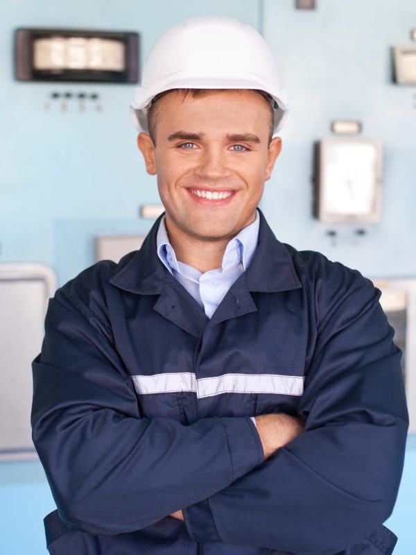 Portrait of young engineer at control room